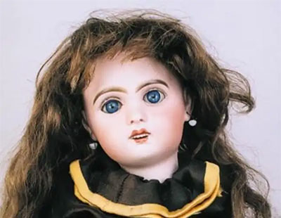 A Jumeau bisque doll, French C 1900, impressed +5, with open mouth, weighted blue eyes