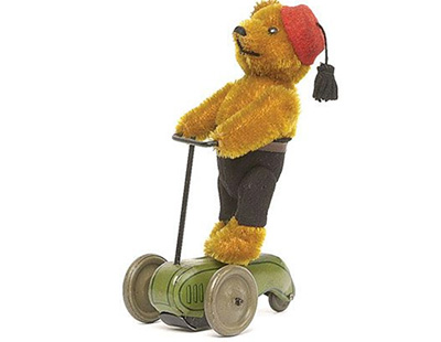 Schuco - 861 - Roller Scooter with Bear rider - gold mohair bear with black tin eyes