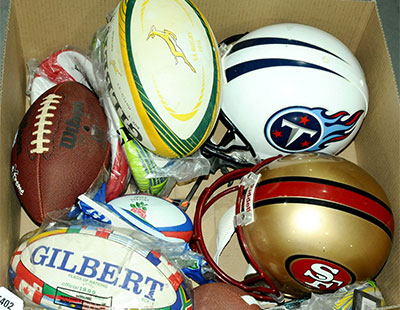 Sports Memorabilia - a quantity of American Football/Rugby items comprising of a number of rugby