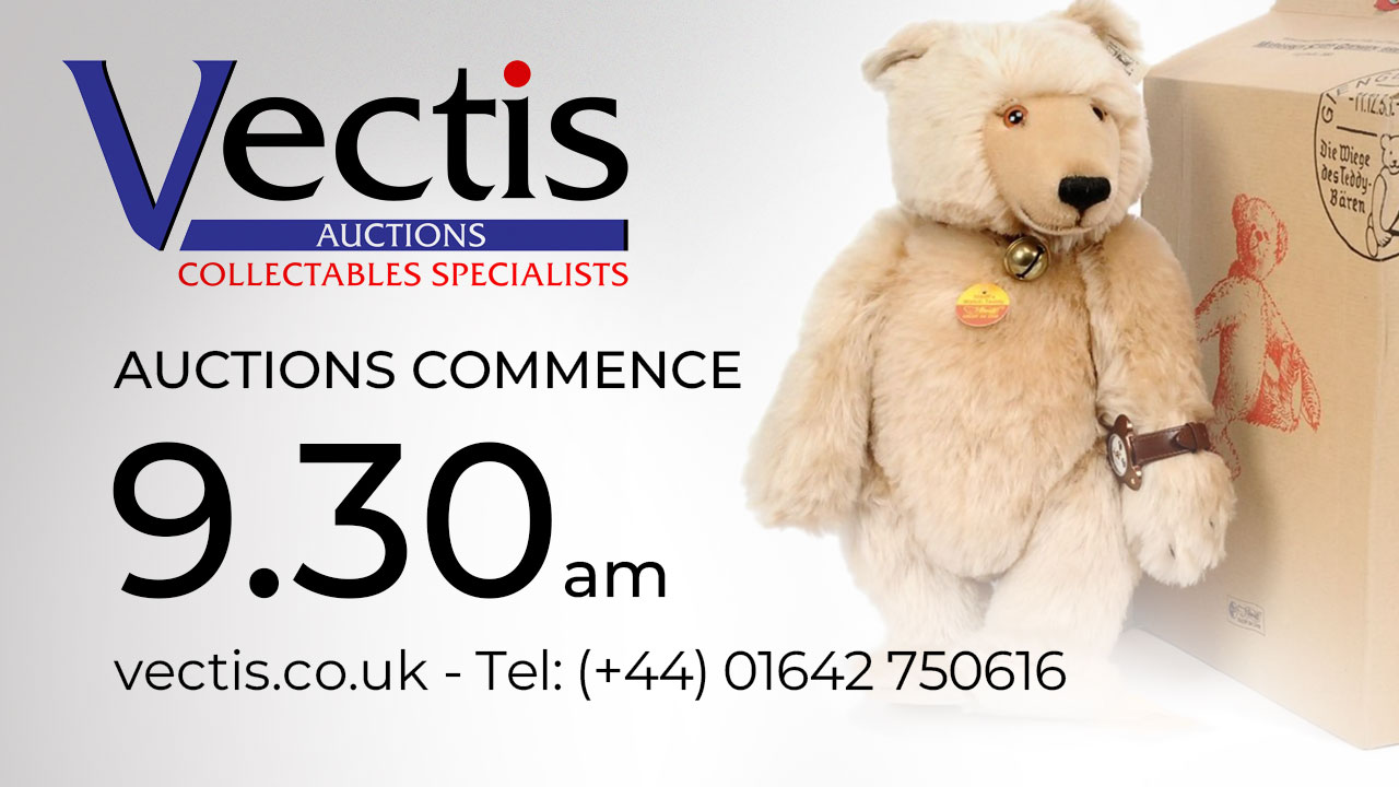 Image of a teddy bear wearing a watch to depict the change of start time for auctions 