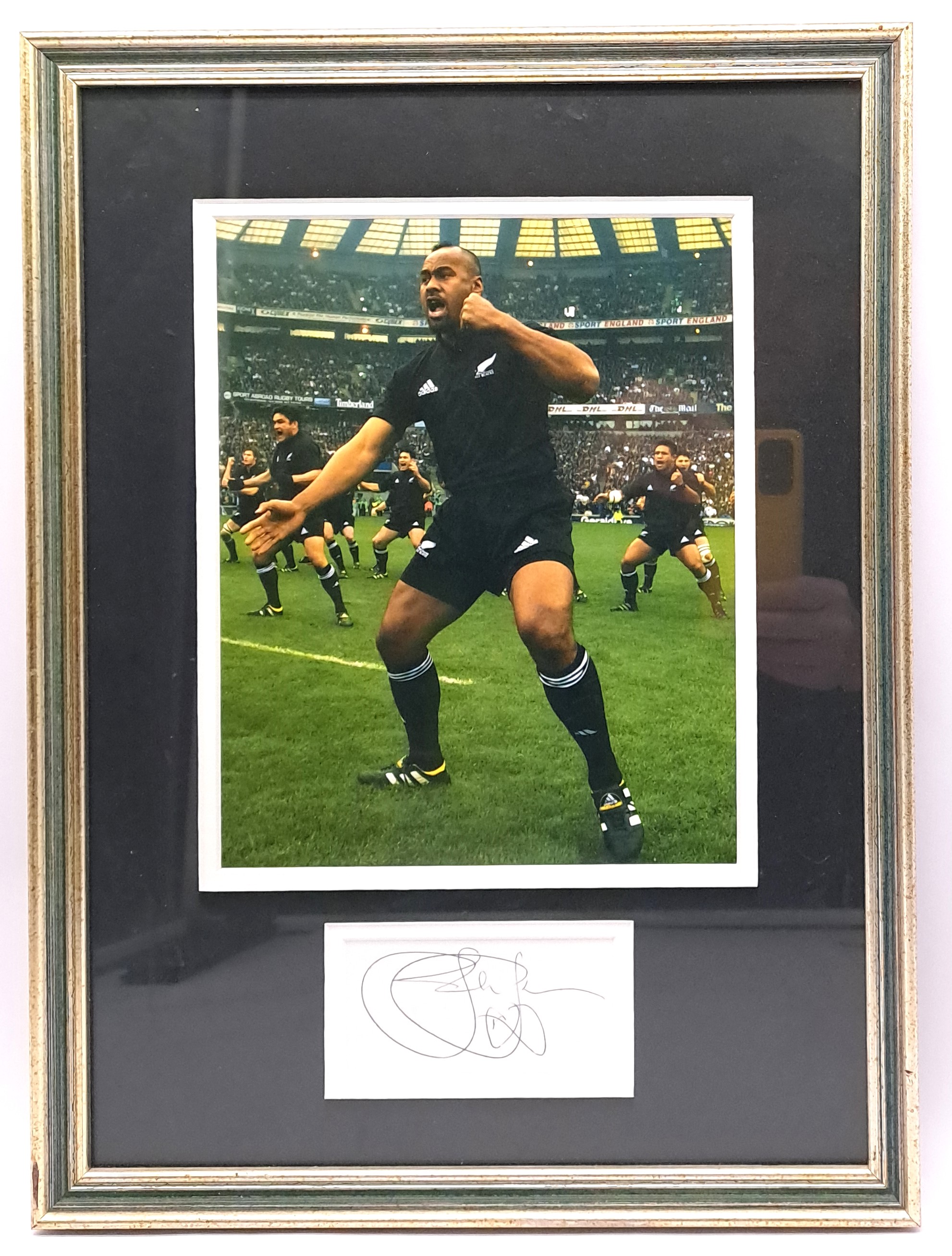 Rugby Memorabilia, signed framed mounted David Jonah Lomu Signature (New Zealand All Blacks) along with mounted photograph/print.